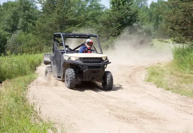 A Polaris Ranger On A Sand Path