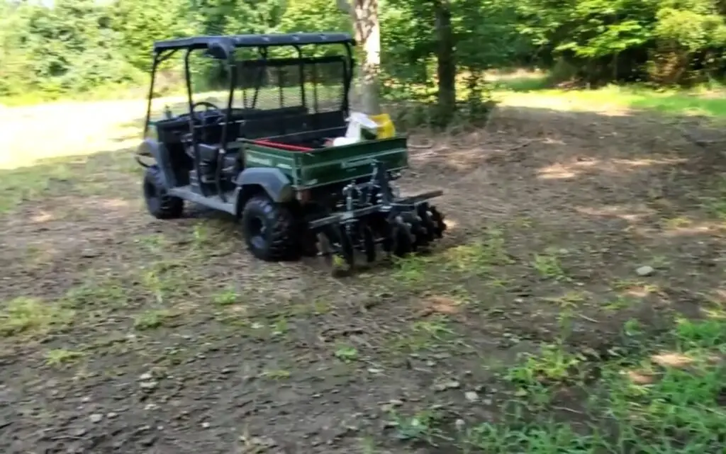 I took the reins of my UTV, armed with a cultivator, contributing to the conservation effort by maintaining and expanding food plots for the benefit of local fauna.