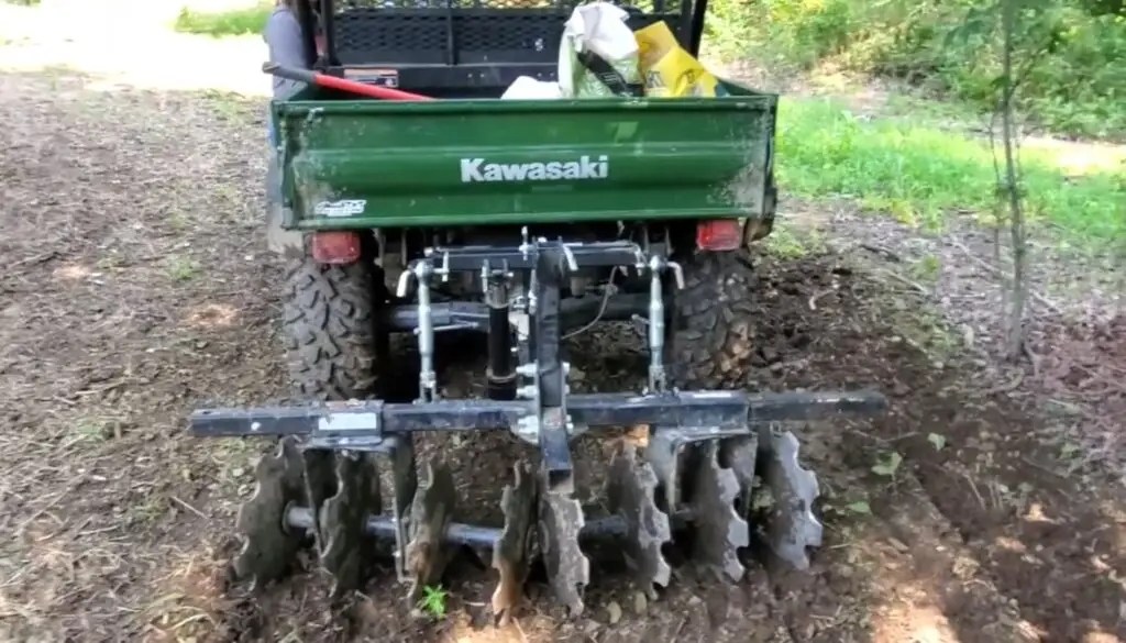 Exploring the woods in my UTV, I embraced the role of a wildlife steward, using a seed spreader to contribute to the creation of sustainable food plots.