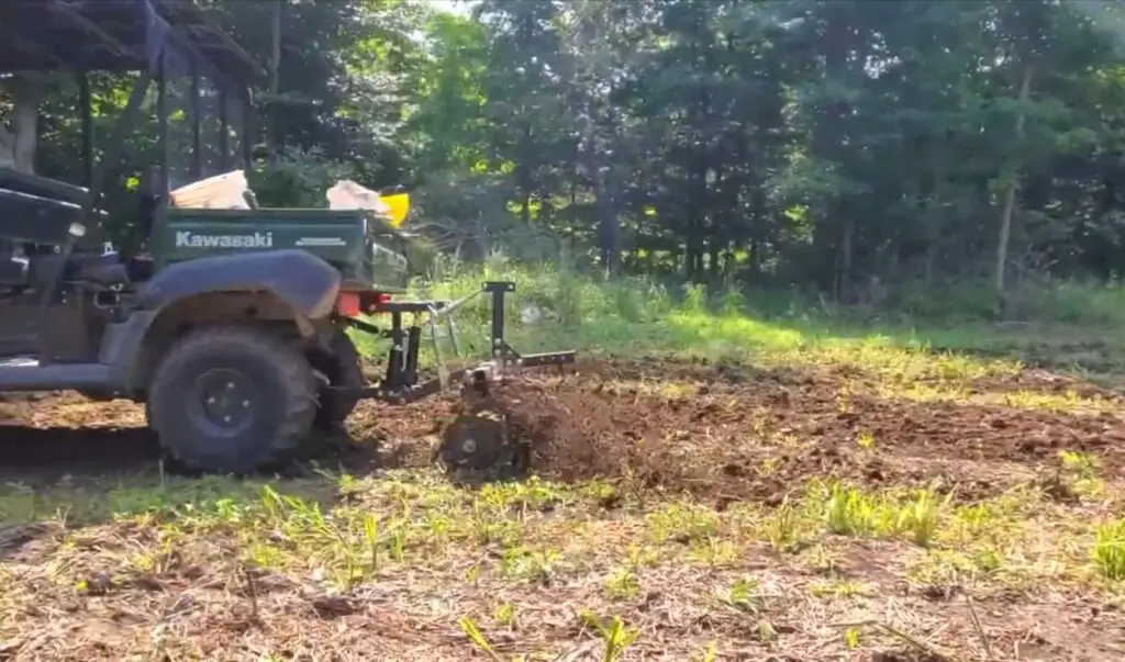 I embarked on an outdoor adventure, using my UTV's plough attachment to create neat furrows for planting, cultivating a beautiful food plot for the ecosystem.