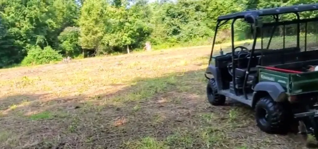 Cruising through the wilderness in my UTV, I planted seeds using a seed spreader, taking pride in playing a role in sustaining natural habitats with flourishing food plots.