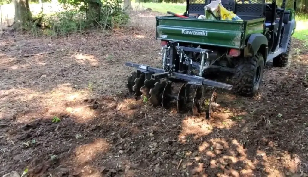 In my UTV, equipped with a cultivator, I played a crucial role in maintaining a flourishing food plot, ensuring a balanced ecosystem for local animals.