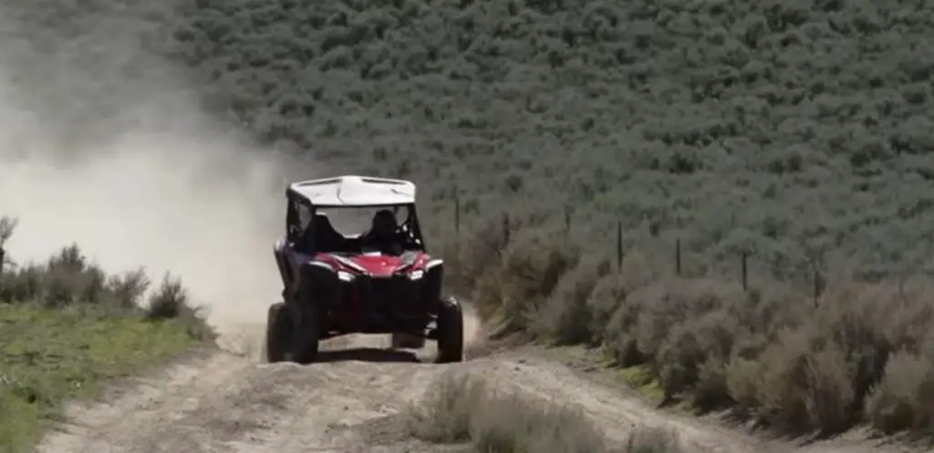 In the heart of the desert, I felt the exhilaration of freedom as my Honda Talon 1000R conquered the sandy dunes with ease, leaving a trail of adventure in its wake.