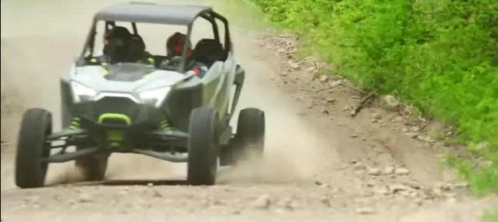 Behind the wheel of my Polaris RZR, I embarked on an off-road escapade through the forest, feeling the adrenaline surge as I tackled steep inclines and treacherous terrain, guided only by the thrill of adventure.