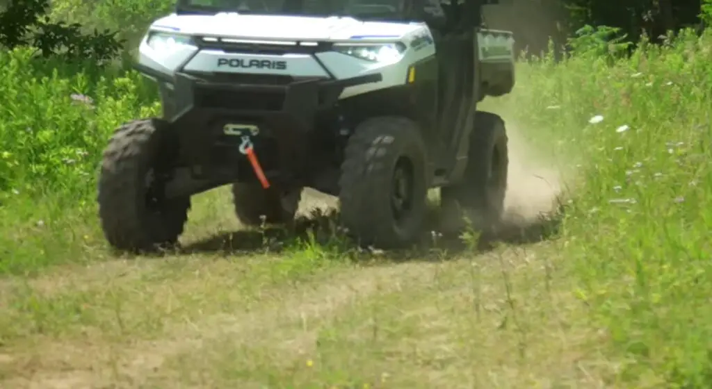 Exploring the untamed beauty of nature in my Polaris Ranger XP Kinetic, I felt a sense of freedom and adventure unlike any other, as I traversed rugged terrain and embraced the thrill of the unknown.