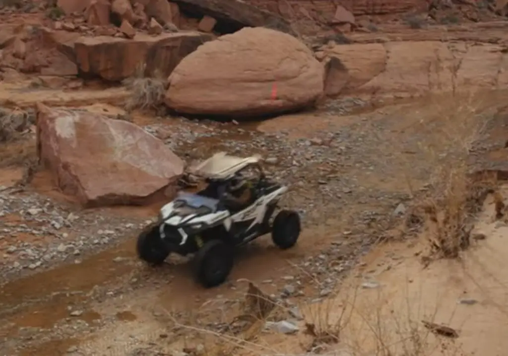 I blazed a trail through Utah's untamed wilderness, my Polaris RZR 1000 carving its mark on the rugged terrain.