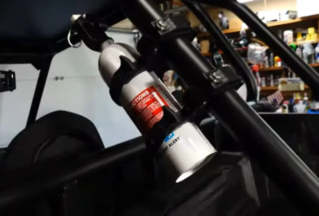 Racing through dirt tracks, I rely on my UTV fire extinguisher to quell any sparks of danger.