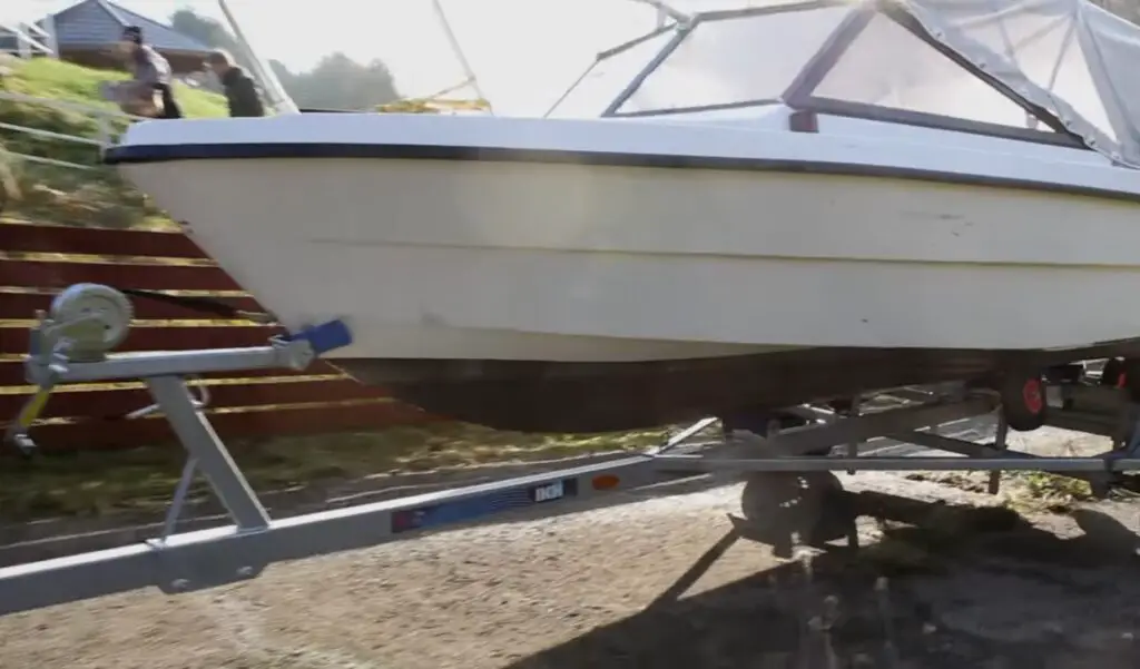 As the waves lap against the shore, I unload the boat, grateful for my UTV's unwavering strength and durability.