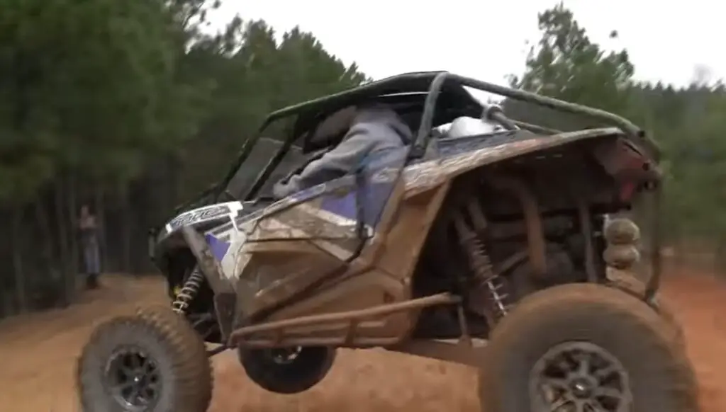 Steering with precision, I tackled the daunting slope, my UTV roaring with power as I chased victory in the intense hill climb competition.