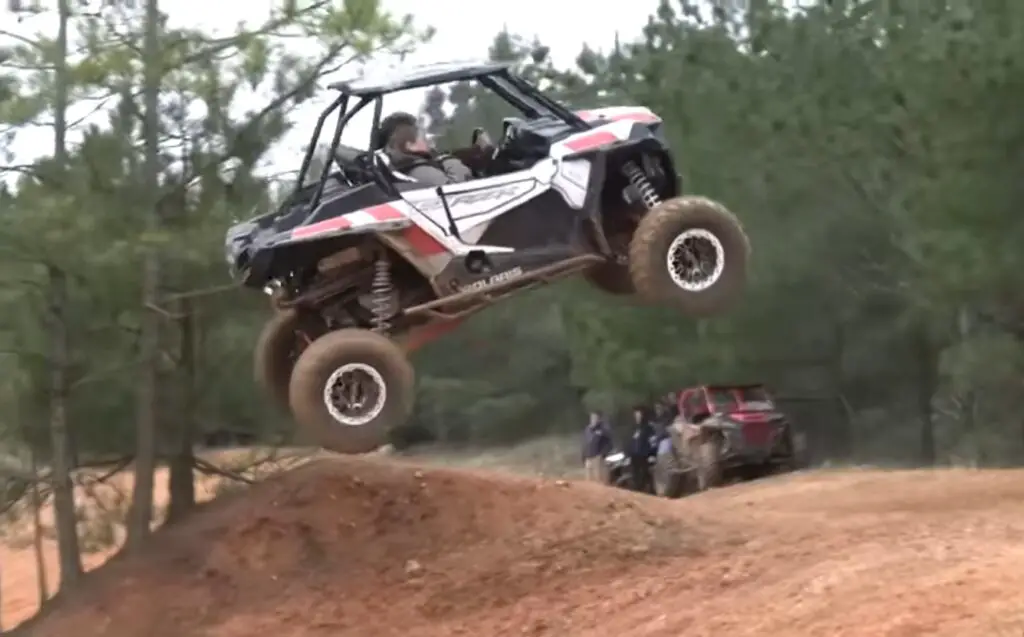 With unwavering resolve, I tackled the steep ascent, the cheers of the crowd spurring me on in the intense UTV hill climb challenge.