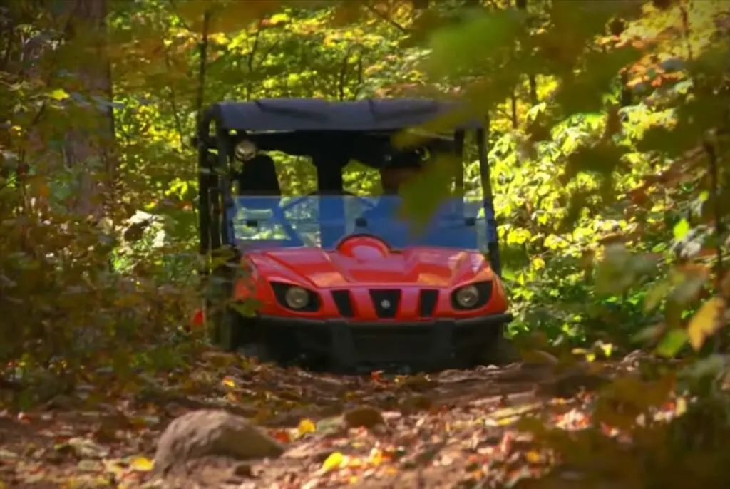 In the midst of the lush greenery, I embraced the thrill of a Yamaha Rhino 700 adventure, its robust build and responsive handling allowing me to explore the forest's hidden gems.