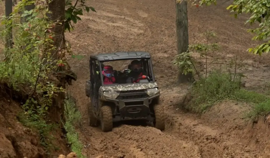 I love how the Polaris Ranger Crew XP 1000 glides over dirt tracks, making every off-road adventure exhilarating.