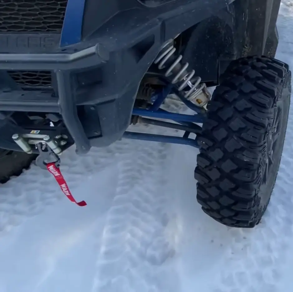 As the snowflakes danced around me, I maintained my UTV tire pressure at 7 PSI for optimal traction.