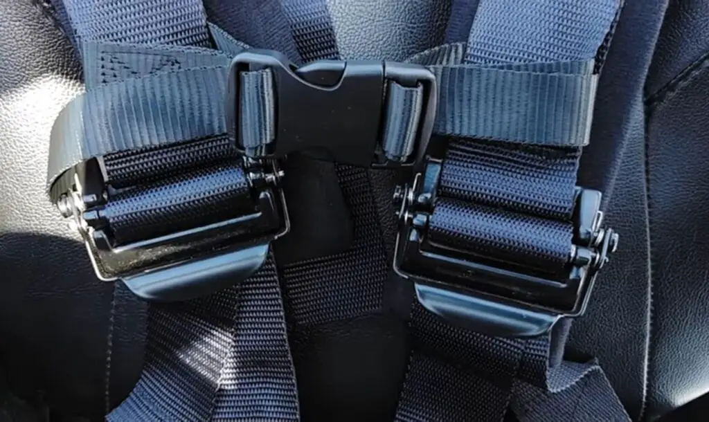 All terrain vehicle seat belt