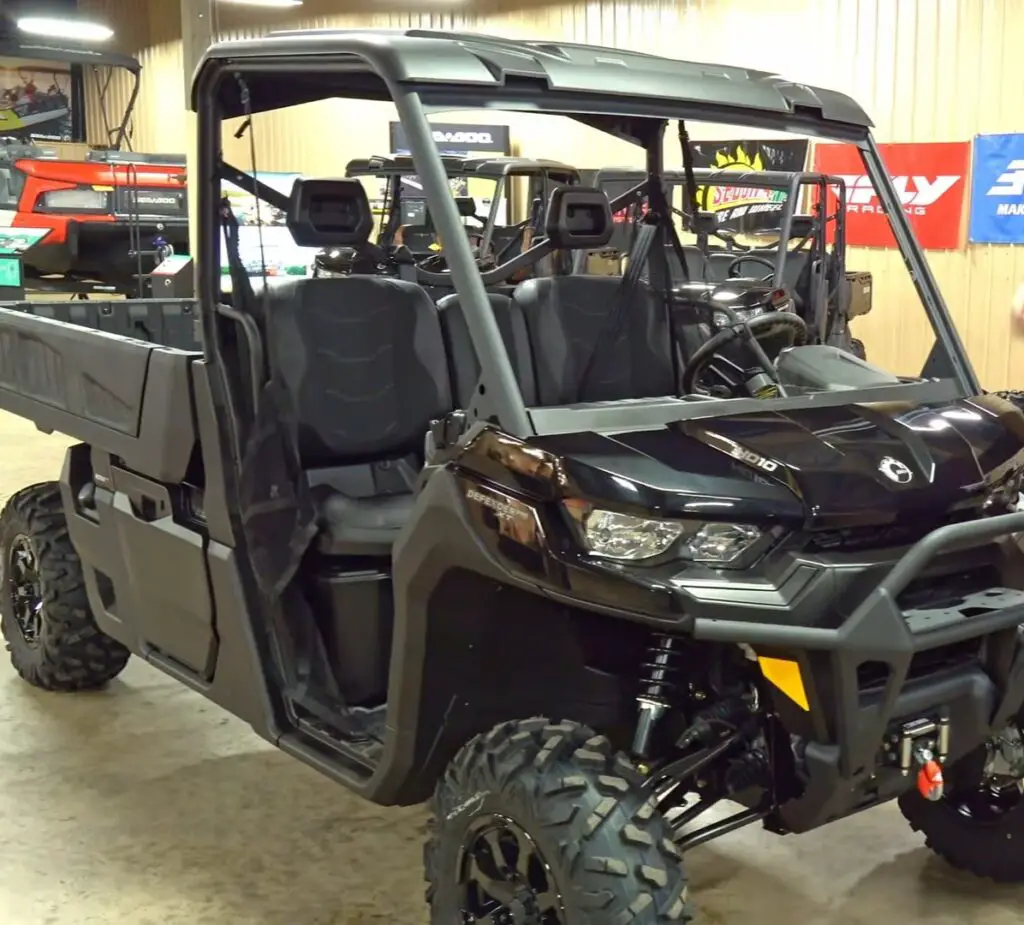 A Can-am defender Pro XT is parked in a showroom.