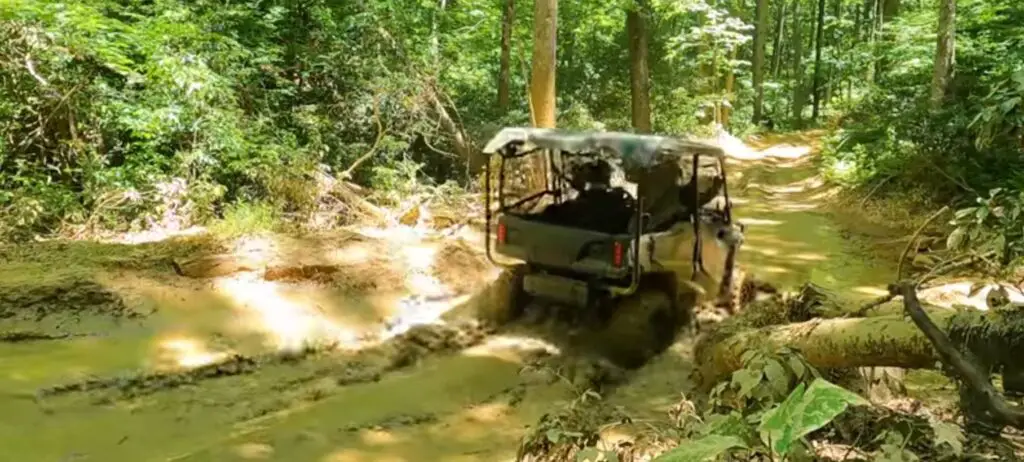 I was driving my Honda Pioneer 1000 UTV through deep mud after fixing engine stalling problem.