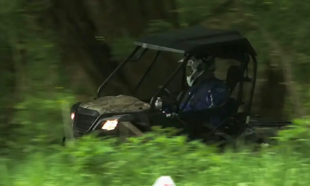 Through the forest's depths, I trusted my Honda Pioneer 500 to guide me, each twist and turn a testament to our unbreakable bond, a fearless duo in the wilderness.