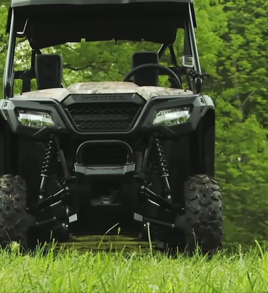 Amidst the verdant landscape, I let my Honda Pioneer 500 lead the way, each journey an exhilarating escape into the heart of nature's beauty.