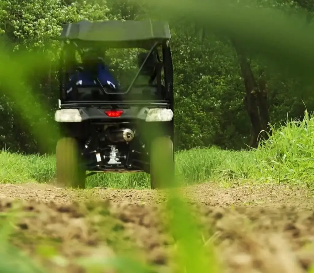 Along dusty trails, I revved up my Honda Pioneer 500, the roar of its engine a call to adventure, a lone rider seeking thrills in the untamed wilderness.