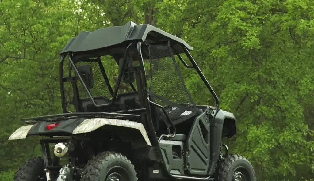 Amidst towering trees, I guided my Honda Pioneer 500 with precision, each turn a testament to our symbiotic relationship, a fearless duo conquering the forest's depths.