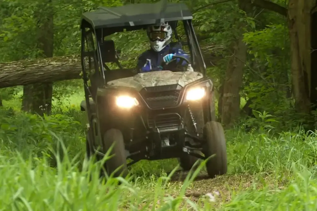 In the heart of the jungle, I relied on my Honda Pioneer 500 to navigate the unknown, its steady engine a reassuring hum, a brave adventurer forging ahead into the wild unknown.