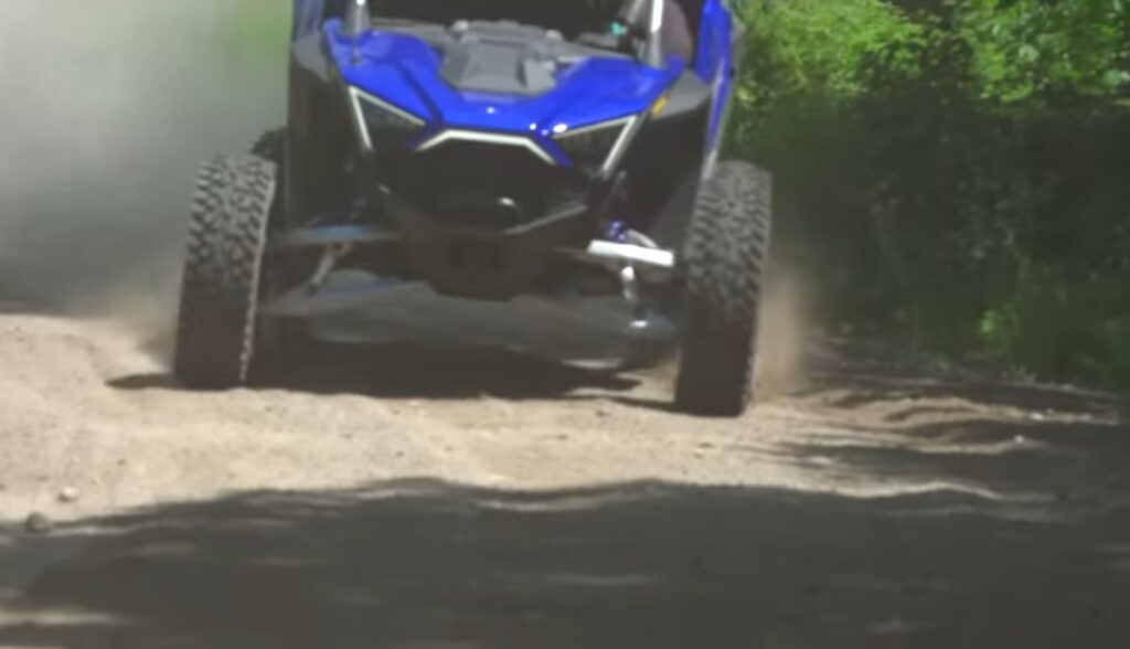 I was driving the Polaris RZR UTV through a dirt road.