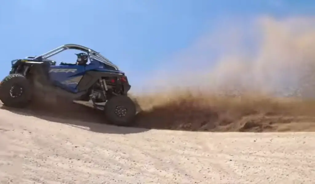 I tackled the challenging desert dunes, my Polaris RZR gliding effortlessly over the golden sand.