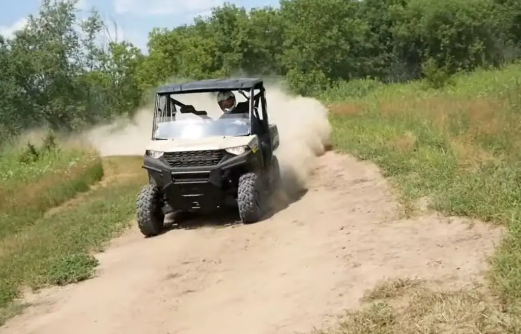 Dust kicked up behind me as I raced my Polaris Ranger 1000 down the dirt road, embracing the freedom of the open path.