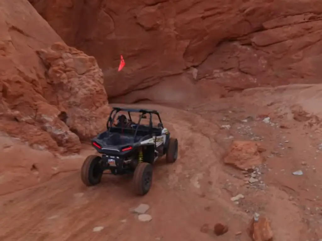 With adrenaline pumping, I tackled the rugged terrain, my Polaris RZR XP 1000 conquering the rocky trails as I embraced the thrill of the dirt adventure.