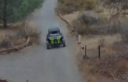 A Polaris Turbo is being driven through a road in California.