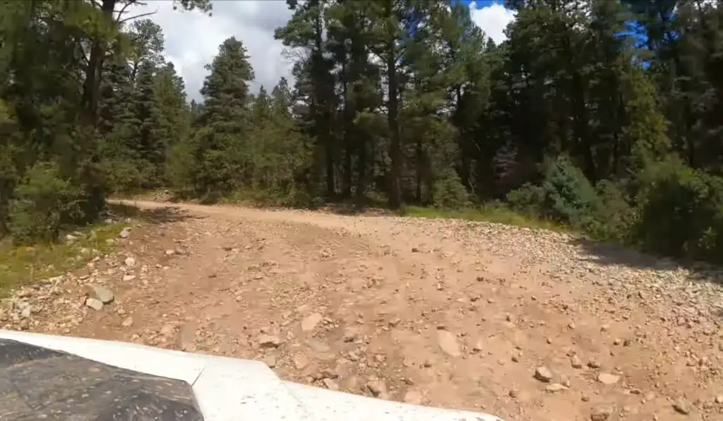 I embraced the challenge of conquering the rocky terrain of UTV Red River, NM, with each bump fueling my determination to explore further.