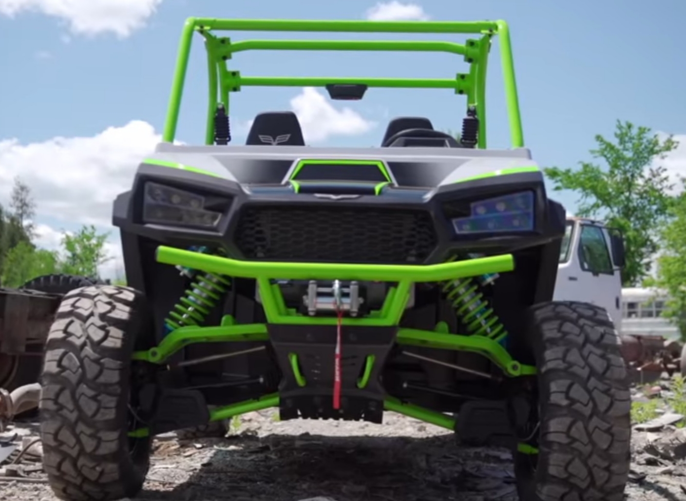 A Textron Havoc X is parked on a dirt surface.