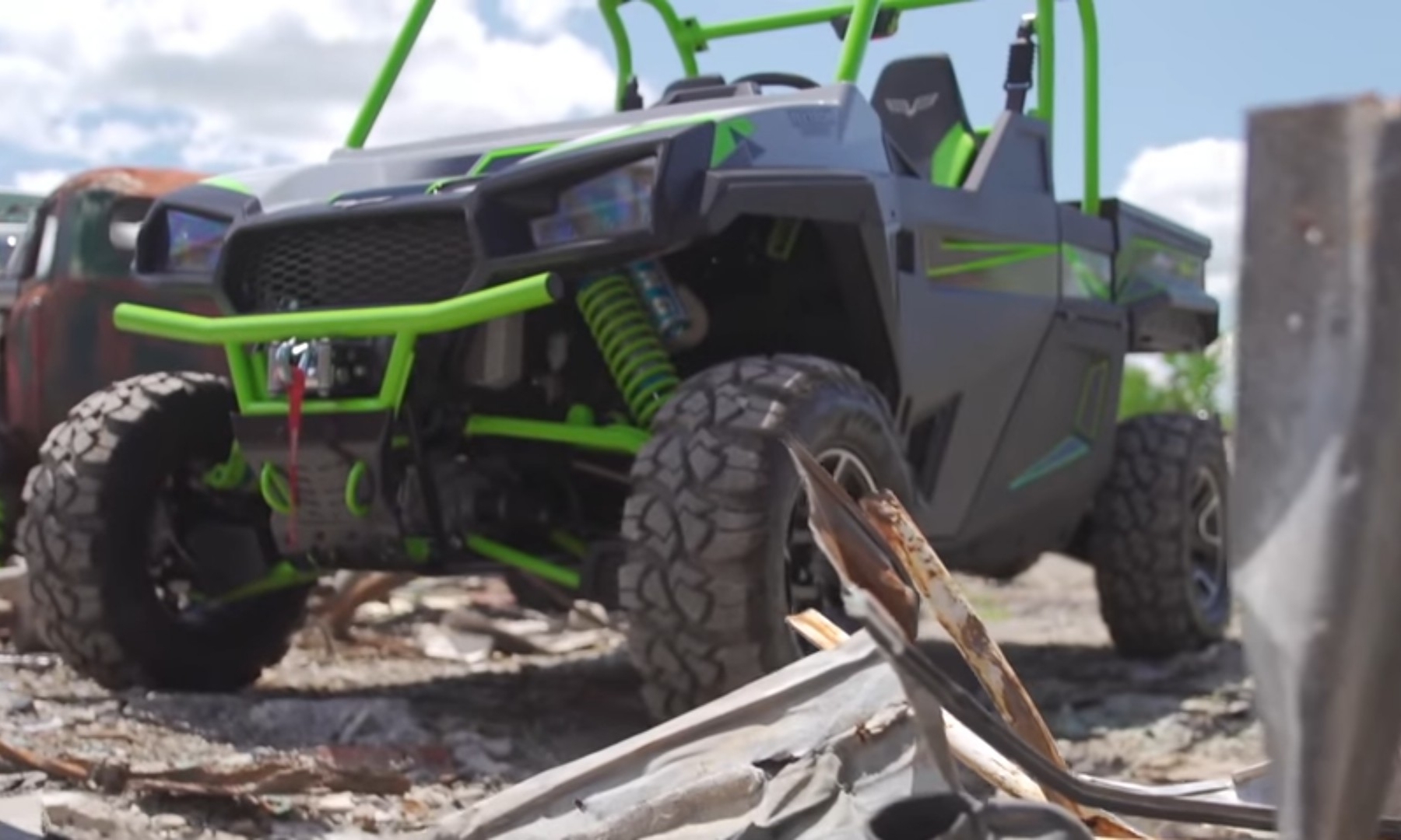 A Textron Havoc X is parked on a dirt surface.