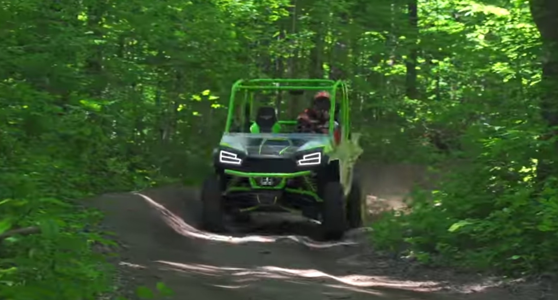 A Textron Havoc X is being driven through a jungle road.