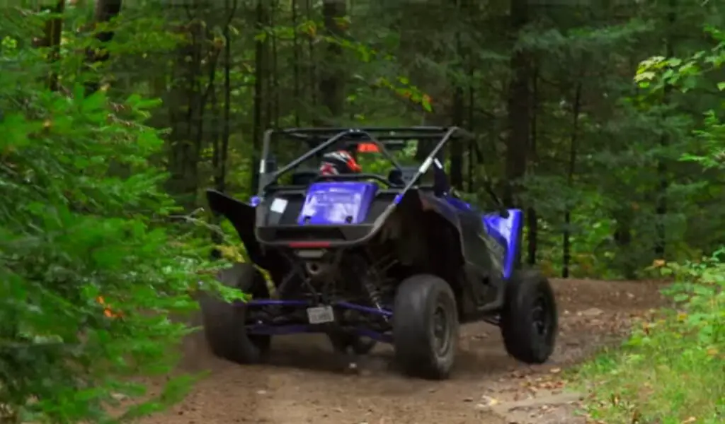 In the heart of the jungle, I navigated dense foliage and muddy paths, the Yamaha YXZ1000R's power and agility guiding me through the wilderness.